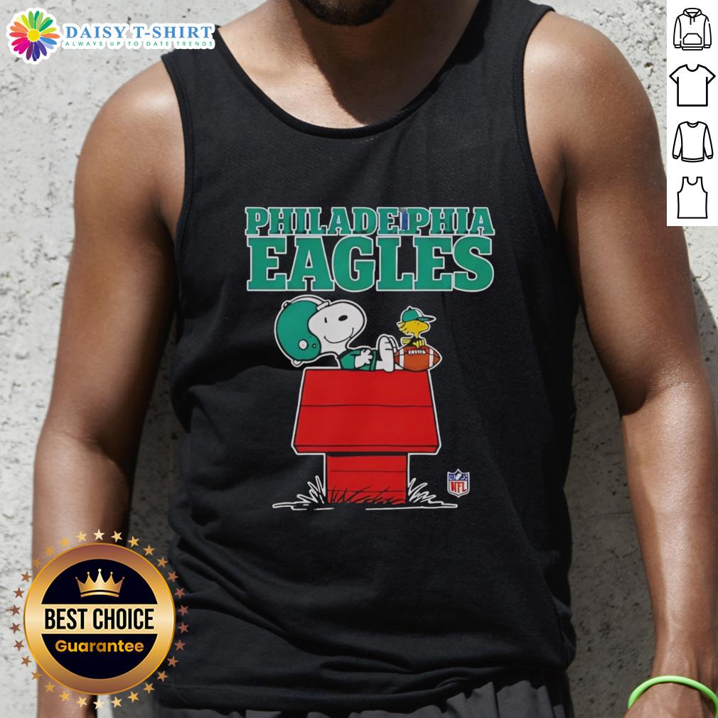 Official Philadelphia Eagles Snoopy tank top in Peanuts style, featuring Snoopy relaxing with a football.