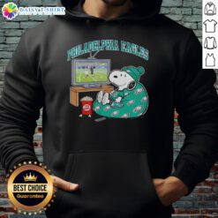Cozy Game Day Peanuts Style Hoodie featuring Snoopy in official Philadelphia Eagles gear, perfect for fans.