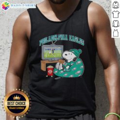 Official Philadelphia Eagles Snoopy cozy game day Peanuts style tank top featuring iconic cartoon design and team colors.