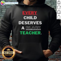 Alt Text: Black hoodie with the phrase Every Child Deserves A Black Teacher displayed prominently, promoting education and diversity.
