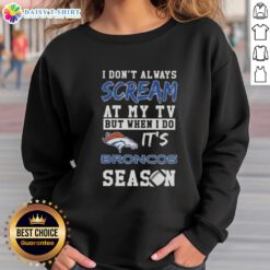 Alt Text: Cozy Denver Broncos season sweatshirt with humorous text, perfect for fans who passionately cheer at the TV.