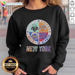 Top New York Giants, Mets, Knicks, and Liberty mashup logo sweatshirt showcasing iconic NYC sports teams.