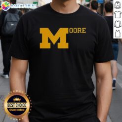 Top Sherrone Moore Michigan Football T-Shirt featuring bold graphics and the team's colors, perfect for fans.