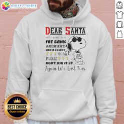 Alt Text: Cozy hoodie featuring Snoopy with the quote Dear Santa, all I want is a fat bank account and a skinny body.