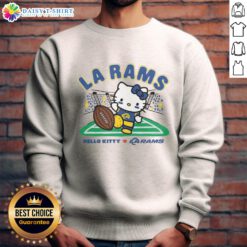 Awesome Hello Kitty x Los Angeles Rams Kickoff Sweatshirt featuring cute design and team colors for stylish fans.