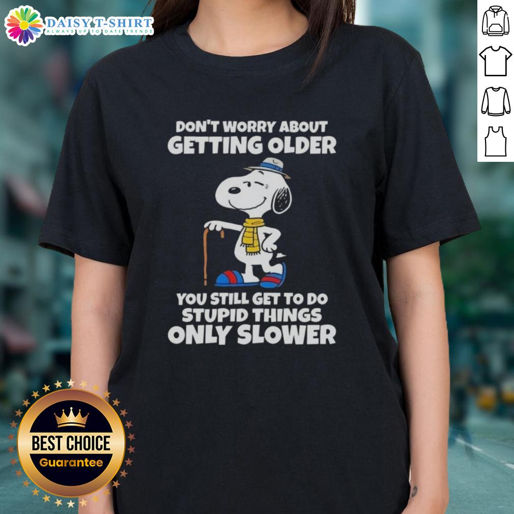 Alt Text: Snoopy graphic tee with quote: 'Don't worry about getting older, you still get to do stupid things, only slower.'