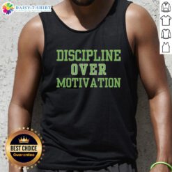 Alt Text: Fit person wearing a 'Good Discipline Over Motivation' tank top during a gym workout, showcasing consistency in fitness.