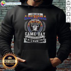 Person wearing a Las Vegas Raiders football hoodie, showcasing team spirit on game day while living in Arizona.