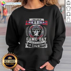 Cozy sweatshirt featuring 'Good I May Live in Arkansas But On Game Day My Heart and Soul Belongs to Las Vegas Raiders' design.