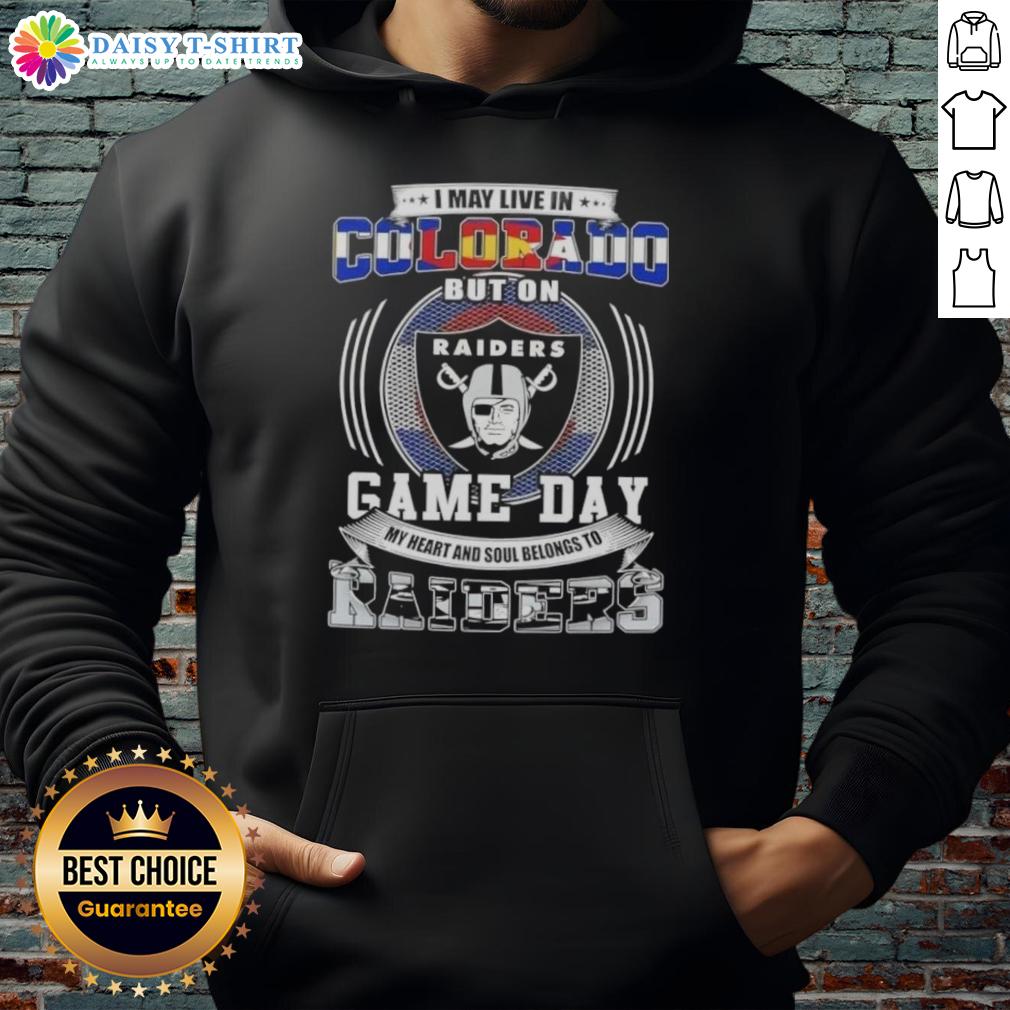 Person wearing a Las Vegas Raiders football hoodie, showcasing team pride despite living in Colorado on game day.