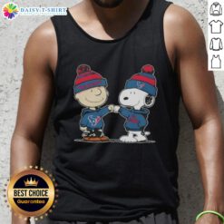 Charlie Brown fist bumping Snoopy on a Houston Texans football tank top, celebrating Good Peanuts style.