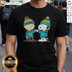 Good Peanuts Charlie Brown fist bump with Snoopy on Jacksonville Jaguars football T-shirt design.