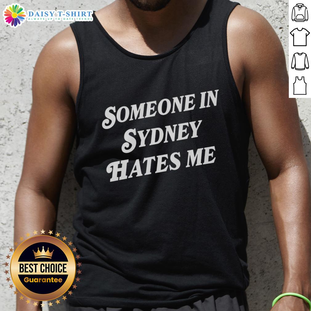 Stylish 'Good Someone in Sydney Hates Me' tank top displayed against a vibrant urban backdrop, perfect for casual wear.