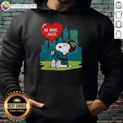 Alt Text: Happy Jacksonville Jaguars X Snoopy cartoon Valentine 2026 hoodie featuring vibrant graphics and team colors.