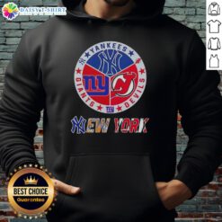Alt Text: Happy New York City Sports hoodie featuring Yankees, Devils, and Giants logos combined in a stylish design.