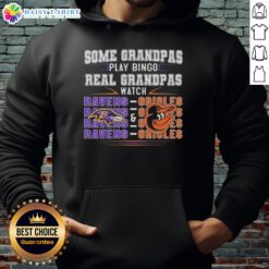 Stylish hoodie featuring Baltimore Ravens and Orioles, perfect for grandmas who prefer watching games over playing bingo.