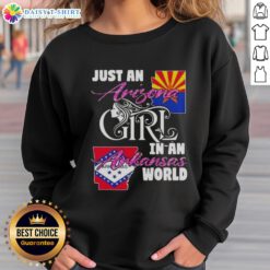 Arizona girl wearing 'Just an Arizona Girl in an Arkansas World' sweatshirt, showcasing a blend of state pride and style.