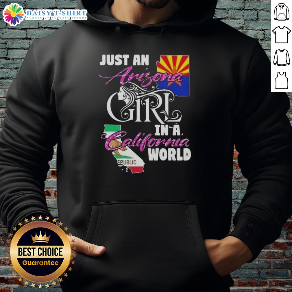 Woman wearing a 'Just An Arizona Girl In A California World' hoodie, showcasing casual style and sunny vibes.