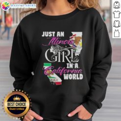 Illinois girl in a California world sweatshirt, showcasing unique style and Midwest pride in sunny surroundings.