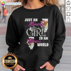 Illinois girl wearing a 'Just an Illinois Girl in an Illinois World' sweatshirt, showcasing local pride and style.