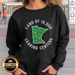 Cozy Nice Land of 10,000 Learning Centers sweatshirt featuring vibrant colors and a modern design for students.