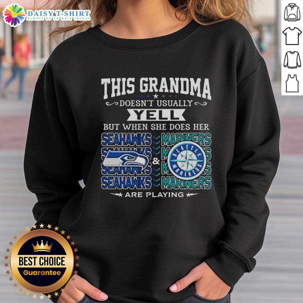 Grandma wearing a Seattle Seahawks and Mariners sweatshirt, excitedly cheering at a game, showcasing team spirit.