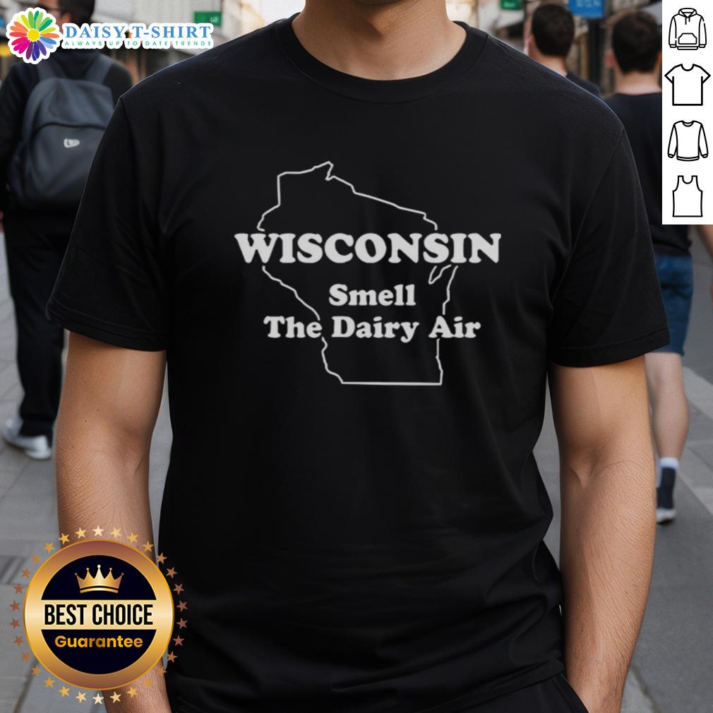 Alt Text: Official The Wire Herc Wisconsin Smell The Dairy Air T-Shirt featuring a bold graphic design and comfortable fit.
