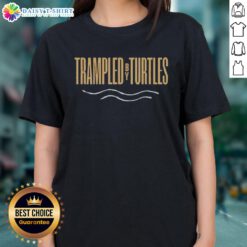 Official Trampled By Turtles with Wild Horses 2026 Tour logo on a ladies tee, featuring vibrant colors and stylish design.