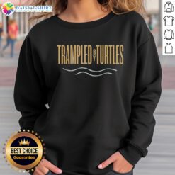 Alt Text: Official Trampled By Turtles with Wild Horses 2026 Tour logo sweatshirt featuring vibrant design and tour details.