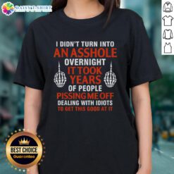 Humorous ladies tee featuring the quote 'I didn't turn into an asshole overnight, it took years' in stylish typography.