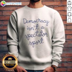 Nicolle Wallace sweatshirt featuring 'Premium Democracy Is Not A Spectator Sport' slogan for political activism.