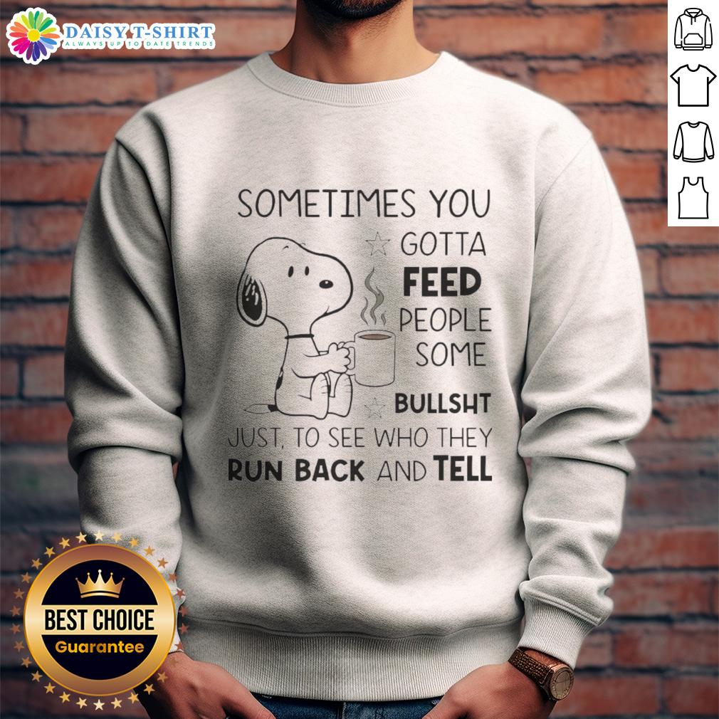 Alt Text: Snoopy sweatshirt featuring the quote 'Sometimes you gotta feed people some bullsht' with a playful design.