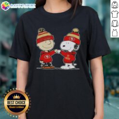 Alt Text: Charlie Brown and Snoopy fist bump in San Francisco 49ers football ladies tee, perfect for Peanuts fans.