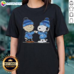 Charlie Brown and Snoopy fist bump in Tennessee Titans football ladies tee design featuring Peanuts characters.