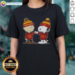 Charlie Brown fist bumping Snoopy on Washington Commanders football ladies tee, perfect for Peanuts fans and sports lovers.