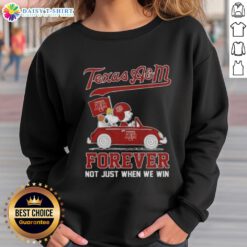 Charlie Brown and Snoopy in a car on a Texas A&M Aggies sweatshirt, celebrating spirit with 'Forever, Not Just When We Win'.