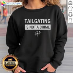 Alt Text: Awesome Tailgating Is Not A Crime Sweatshirt featuring bold text, perfect for game day and tailgating enthusiasts.