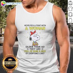 Good Peanuts Snoopy tank top featuring a humorous quote about women over 60 and their fierce attitude.