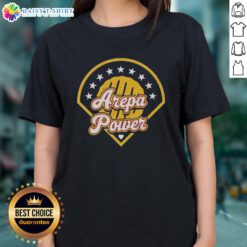 Nice Arepa Power logo featured on a stylish ladies tee, showcasing vibrant colors and trendy design for casual wear.