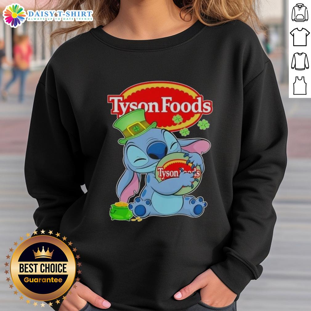 Cozy sweatshirt featuring a nice stitch design with St. Patrick's hug and Tyson Foods logo, perfect for festive wear.