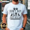 Official Don'T Buy Dog Love Just Rescue Rescue Dog T-Shirt featuring a heartwarming design promoting pet adoption.