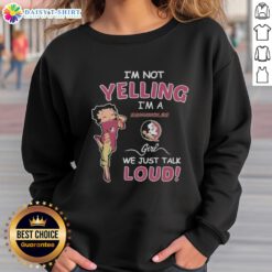 Alt Text: Florida State Seminoles girl wearing 'I'm Not Yelling, We Just Talk Loud' sweatshirt, showcasing team spirit and style.