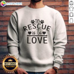 Cozy 'Official To Rescue Is To Love' sweatshirt featuring a rescue dog design, perfect for dog lovers and advocates.