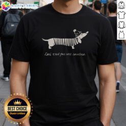 Stylish Ceci N'Est Pas Une Saucisse T-Shirt featuring bold text design, perfect for art and fashion enthusiasts.