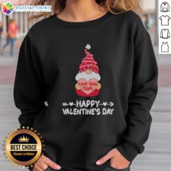 Pretty Valentine's Day sweatshirt featuring a cute gnome and 'Love You More' design, perfect for celebrating love.