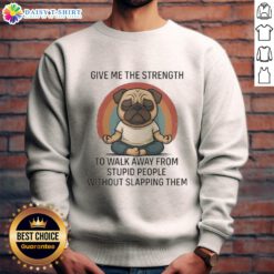 Top pug sweatshirt featuring 'Give Me The Strength' quote, perfect for dog lovers and humor enthusiasts.