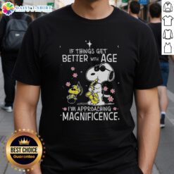 Alt Text: Snoopy and Woodstock graphic on 'If Things Get Better With Age I'm Approaching Magnificence' T-shirt design.