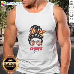 Awesome Kansas City Chiefs girl in a messy bun, wearing glasses and a tank top, cheering for her team.