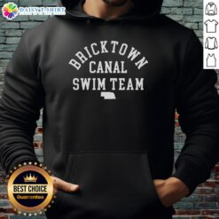 Good Nebraska Bricktown Canal Swim Team hoodie featuring a vibrant design and logo, perfect for swim enthusiasts.