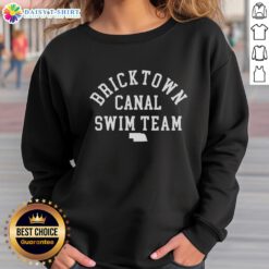 Alt Text: Good Nebraska Bricktown Canal Swim Team sweatshirt featuring a vibrant design and comfortable fit.